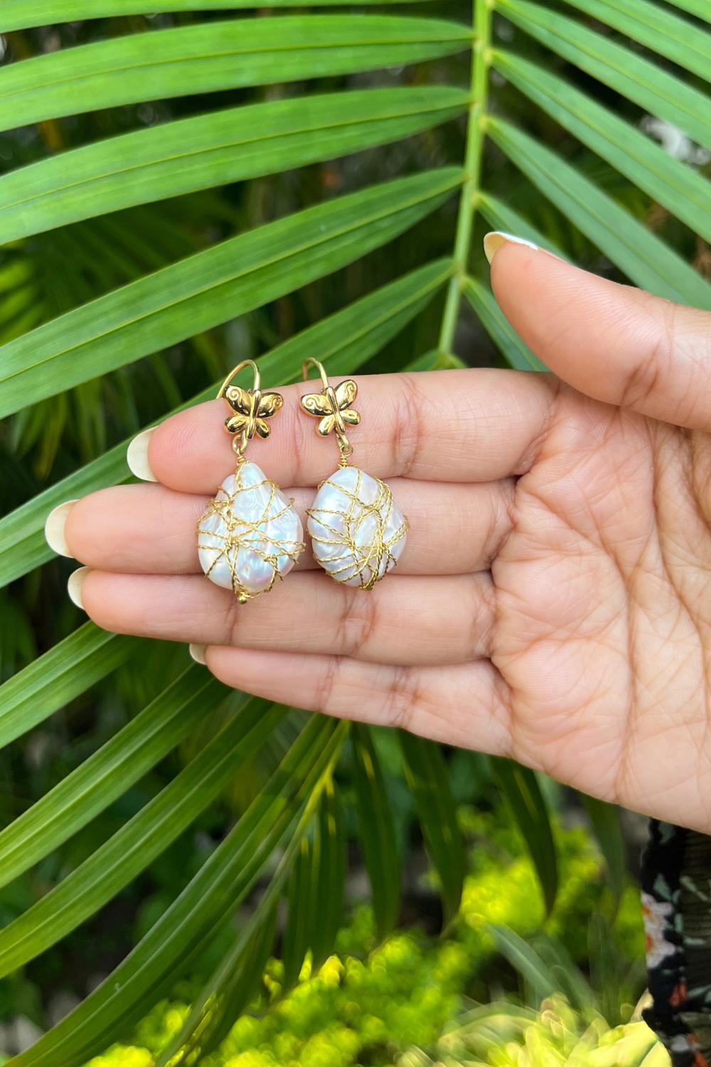TWISTED GOLD-WRAPPED BUTTERFLY BAROQUE EARRINGS