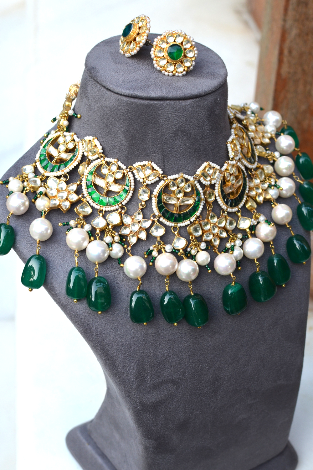 STATEMENT EMERALD BRIDAL CHOKER SET WITH JHUMKIS & MANGTIKA