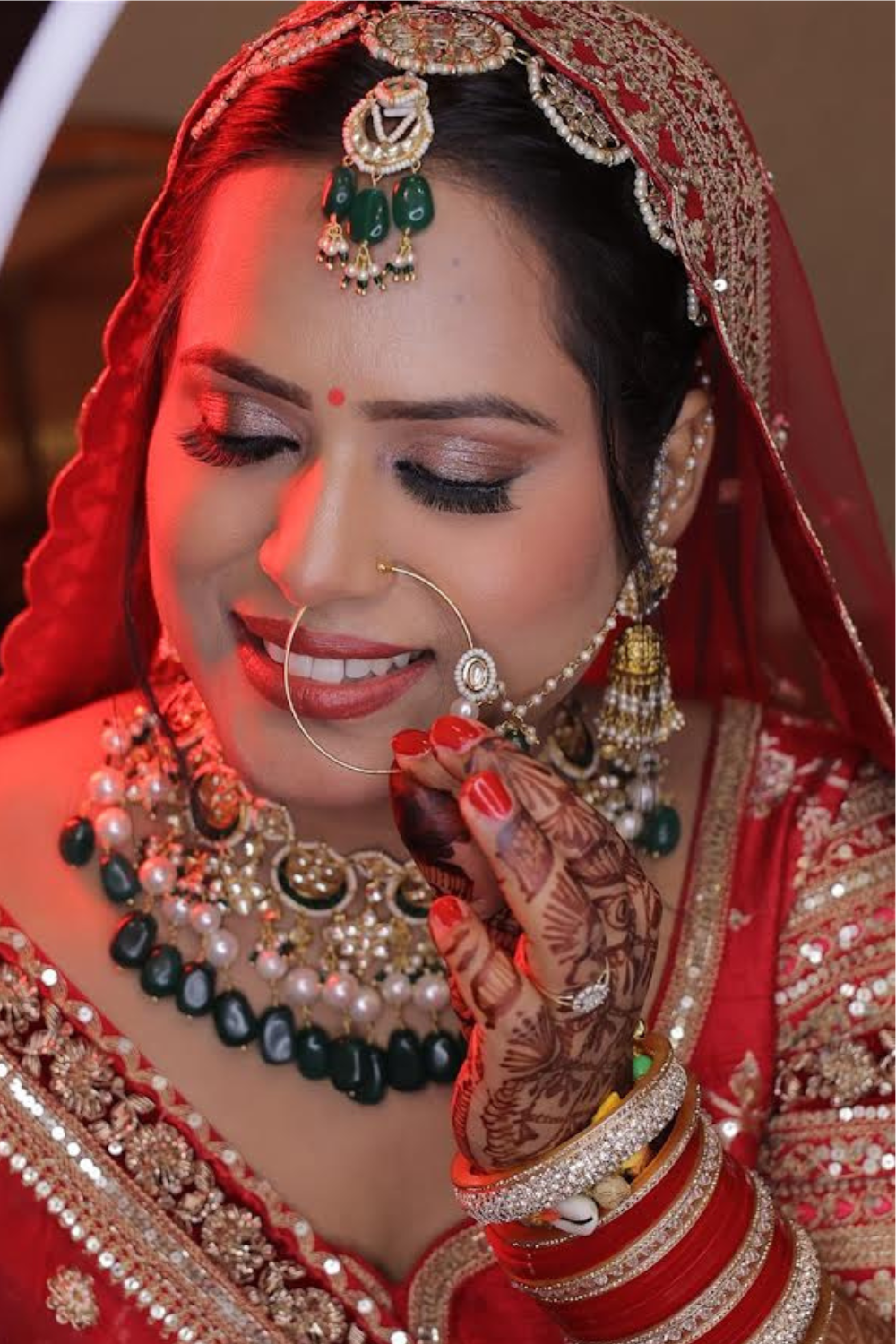 STATEMENT EMERALD BRIDAL CHOKER SET WITH JHUMKIS & MANGTIKA