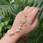 POLKI FLOWER PEARL CHAIN HATHPHOOL