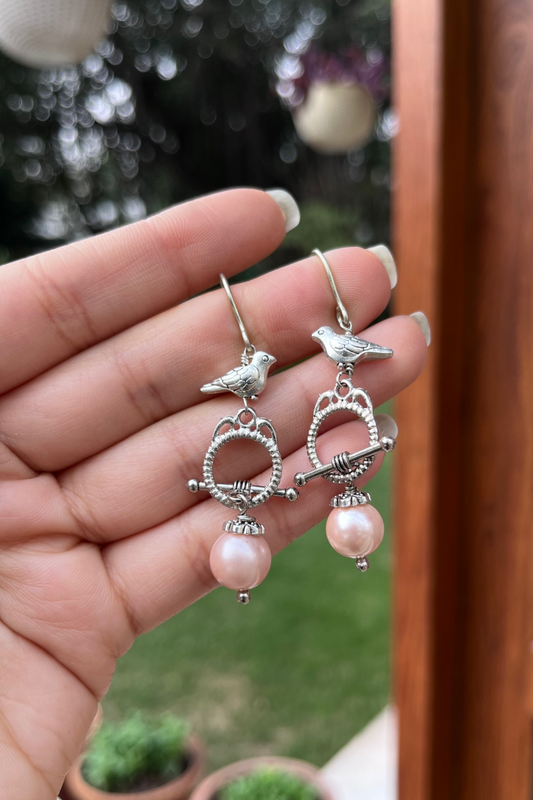 BABY PINK T-LOCK BIRD EARRINGS