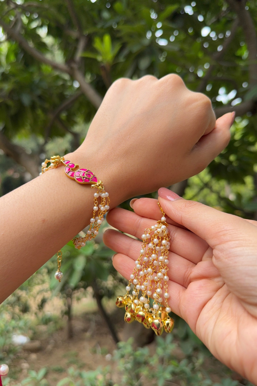 PINK MOR RAKHI BHABHI GHUNGAROO LUMBA BRACELET