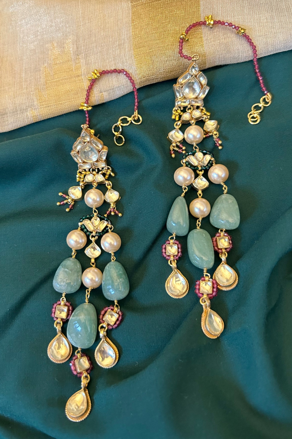 CREAM PEARLS SHOULDER GRAZING TARBOOZI EARRINGS