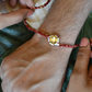 KUBERA LUMBA RAKHI SET- RED