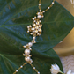 POLKI FLOWER PEARL CHAIN HATHPHOOL