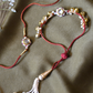 RED GHUNGAROO THREAD RAKHI & LUMBA SET