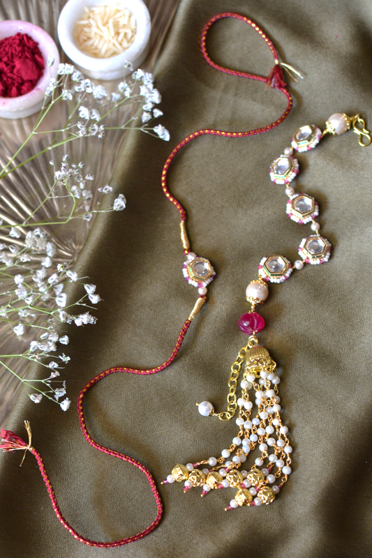 KUBERA LUMBA RAKHI SET- RED
