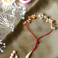 RED GHUNGAROO THREAD RAKHI & LUMBA SET