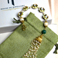 KUBERA TASSEL BRACELET - GREEN