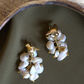 WHITE ASYMMETRICAL PEARL BUNCH BIRD EARRINGS