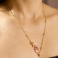 PINK PEACOCK AND GOLDEN BELLS CHAIN NECKLACE