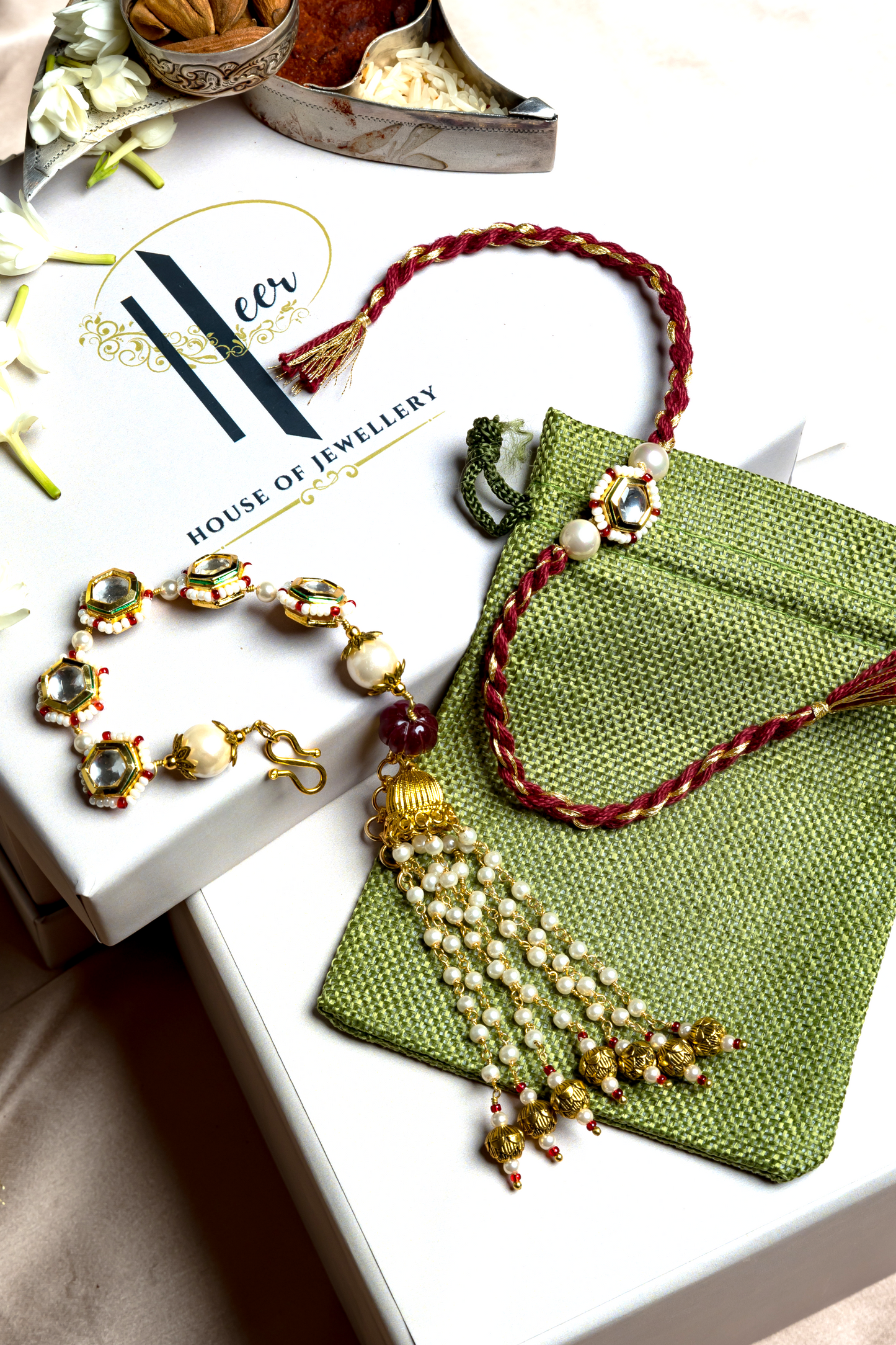 KUBERA LUMBA RAKHI SET- RED